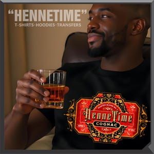 May include: Black t-shirt with a HenneTime Cognac label design. The label is red and gold with the text "HenneTime Cognac" and "Master Blend No. 1". The top of the image has the text "HENNETIME" and "T-SHIRTS HOODIES TRANSFERS".