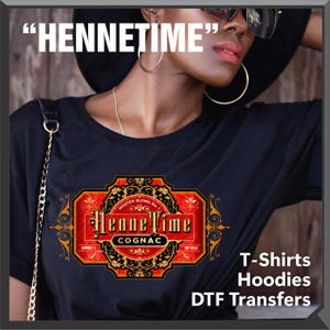 May include: Black t-shirt with a HenneTime Cognac label design in red, gold, and black. The design includes the text "HenneTime" above the label and "T-Shirts Hoodies DTF Transfers" below.