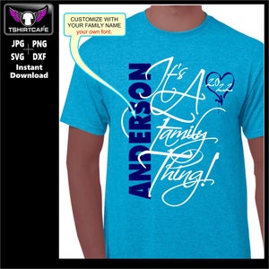 May include: A turquoise blue t-shirt with a white design that says "It's a Family Thing!" with the word "Anderson" in blue vertical script on the left side of the design. A small heart with the number 2022 is above the word "Family".