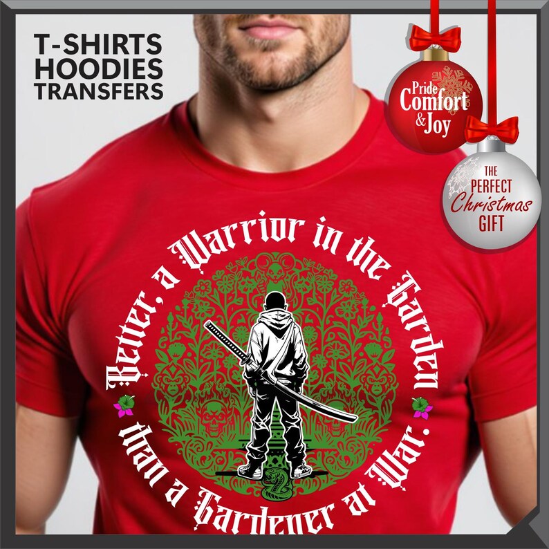 May include: Red t-shirt featuring a graphic of a warrior with a sword inside a green floral design. The text reads "Better, a Warrior in the Garden than a Gardener at War." Additional text includes "T-SHIRTS HOODIES TRANSFERS."