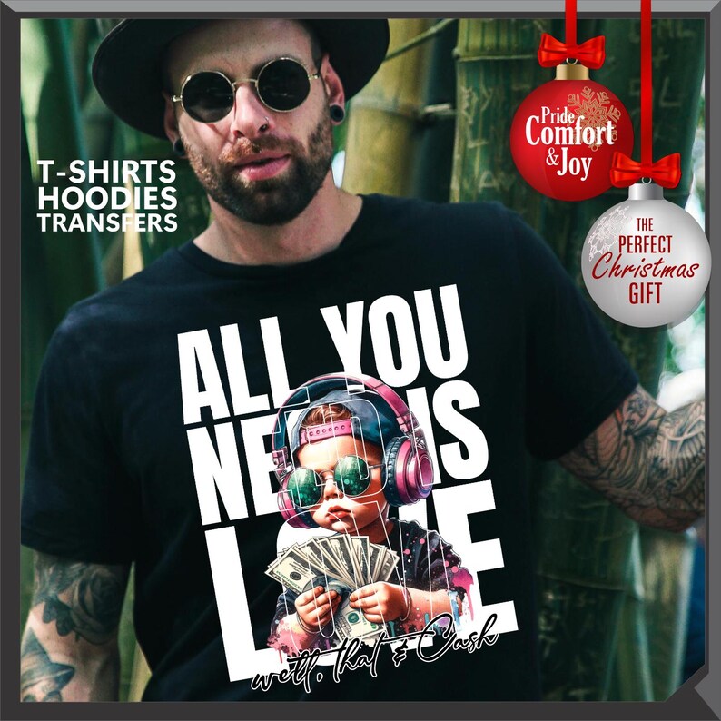 Puede incluir: Camiseta negra con el texto "ALL YOU NEED IS LOVE" y una ilustraci&oacute;n de un beb&eacute; con auriculares y gafas de sol, sosteniendo dinero. La camiseta tambi&eacute;n tiene el texto "well, that's cash". La imagen tambi&eacute;n incluye el texto "T-SHIRTS HOODIES TRANSFERS".