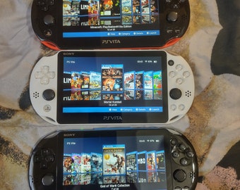 Ps Vita 2000 128gb fully loaded with charger and retrocollection