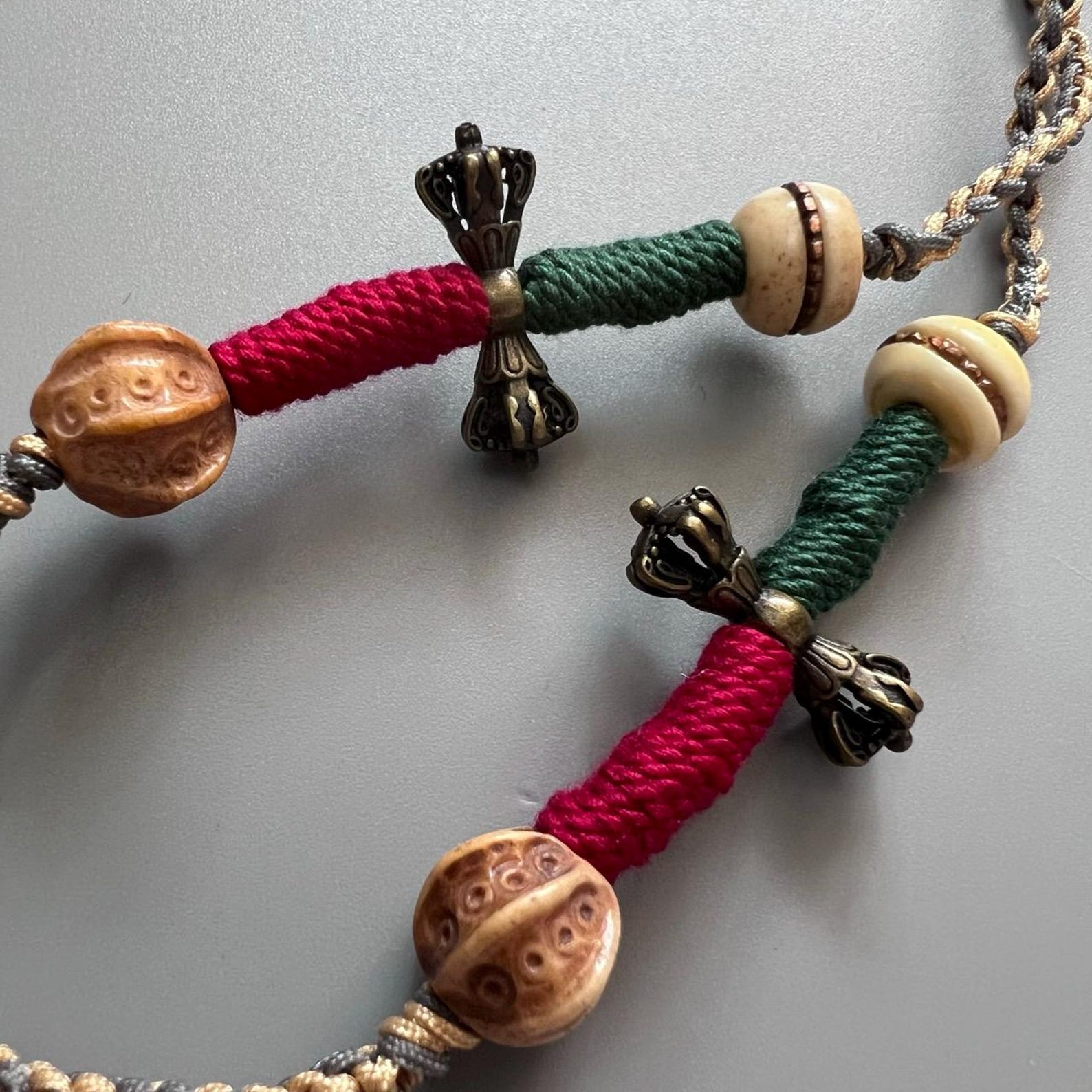 Tibetan Clay Buddha Amulet Necklace: Rahula Protector With Brass Bells ...
