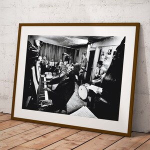 Capture a moment of jazz history with this iconic poster featuring Thelonious Monk and his orchestra at Town Hall in rehearsal, circa 1959.