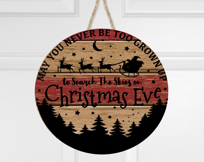 May you never be to grown up to search the skies on Christmas Eve, door hanger