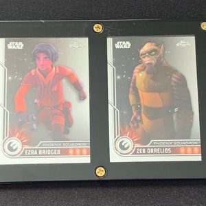 2023 Topps Chrome Star Wars Juego de 2 cartas coleccionables enmarcadas Ezra Bridger y Zeb Orrelios