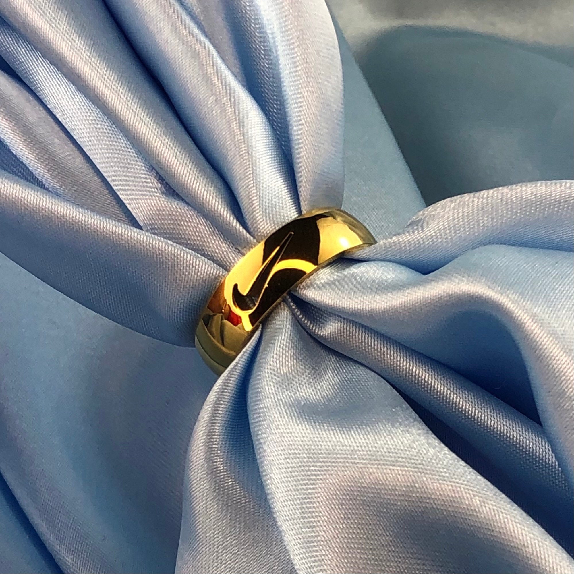 nike tick ring