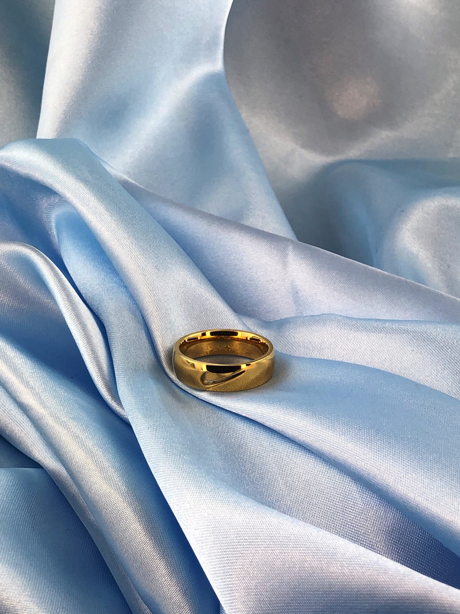 nike tick ring