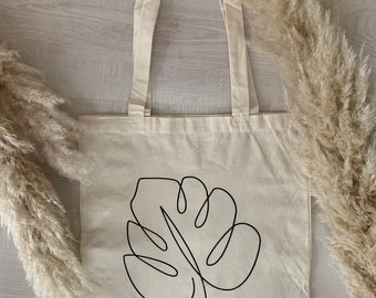 Jute bags made of Oeko-Tex with Monstera