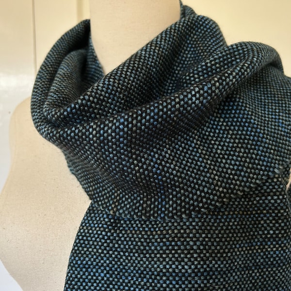 Hand-dyed & Handwoven Scarf made of soft Merino wool in shades of blue, green, gray and black.  Lightweight for any season.  Dressy/Casual
