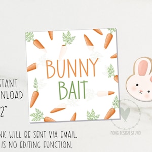 Könnte beinhalten: Quadratische Karte mit dem Text "BUNNY BAIT" in Orange und Grün, umgeben von Karottenillustrationen. Rechts befindet sich ein Hasen-förmiger Keks. Der Text "INSTANT DOWNLOAD" und "2" sind links. Digitaler Download.