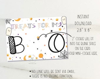 May include: A Halloween-themed card with the words "Treats for my BO" in colorful lettering. The card features a ghost, spiderwebs, stars, and candy corn illustrations. The card measures 3.5" x 5" and is designed to hold a 2" cookie.