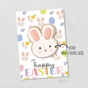 May include: An Easter-themed card with a bunny cookie cutout. The card features a repeating pattern of bunnies, eggs, and flowers. The words "happy EASTER" are written in colorful letters. The text "YOUR MINI-COOKIE HERE" is also present.