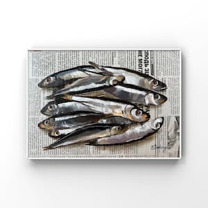 May include: A painting of a group of silver fish on a newspaper background. The newspaper text is in Russian and reads "СИЛА-ВІРИ сподь зи НЕ МОГЛ БУЛО ПОКІЙНИКІВ жили некве. Навіть росіяни бути не CTI SHA зилася з лікая. Але Бородато В субота перед Венеци PA 2011- запитую &laquo;Там тебе не требак, від STANKEVLUCH"