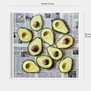 May include: A painting of 10 avocado halves arranged on a newspaper background. The avocados are painted in a realistic style with green skin and brown pits. The newspaper is printed in black and white and has text in Russian.