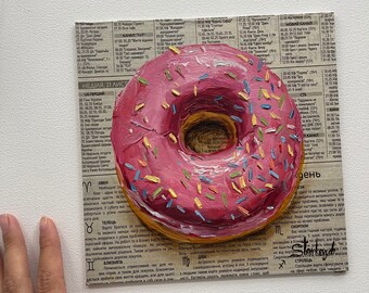 ドーナツの絵画のトレンディな壁アート、新聞紙に描かれたピンクの