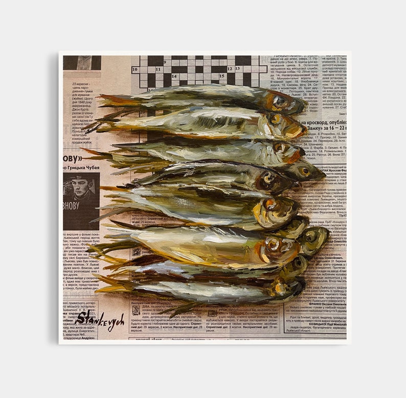 May include: A painting of a pile of fish on a newspaper background. The fish are arranged in a row, with their heads facing the viewer. The newspaper is printed in Russian and features a crossword puzzle. The painting is done in a realistic style, with a focus on the details of the fish and the newspaper.