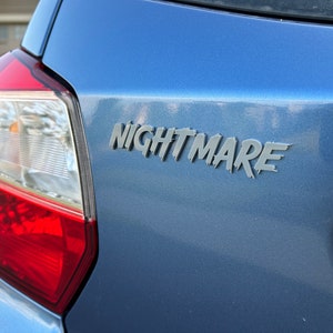 Custom Car Name Emblem Badge - Customized Text Names! NIGHTMARE FONT - Single Layer with Car-Safe Adhesive. 60-second Easy Install!