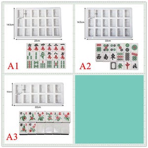 K&ouml;nnte beinhalten: Eine Auswahl an wei&szlig;en Silikonformen zur Herstellung von Mahjong-Steinen, mit den Ma&szlig;en 22 cm x 14,5 cm und 22 cm x 9,8 cm. Das Bild zeigt auch fertige Mahjong-Steine in verschiedenen Farben und Designs, einschlie&szlig;lich chinesischer Schriftzeichen und Symbole.