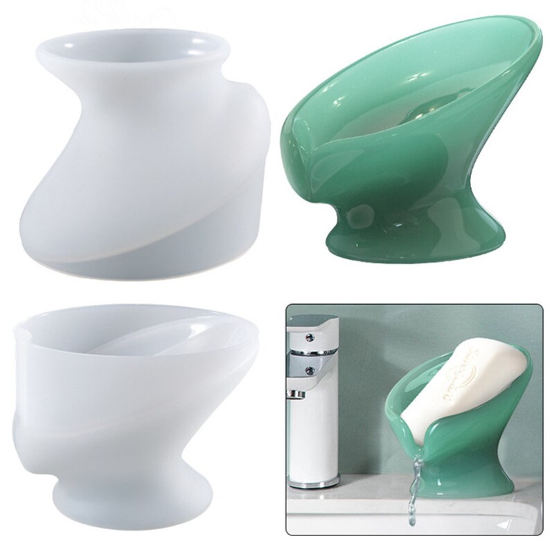 May include: Three white silicone soap dishes, one with a curved design, one with a round base, and one with a flat base. A green ceramic soap dish with a curved design and a round base is also shown.