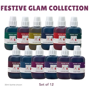 May include: A set of twelve 30ml bottles from the Festive Glam collection, each featuring a white cap and a label with the text Home Ware Design Co. The bottles contain various coloured liquids including emerald, berry, gold, blue, and deep red tones.