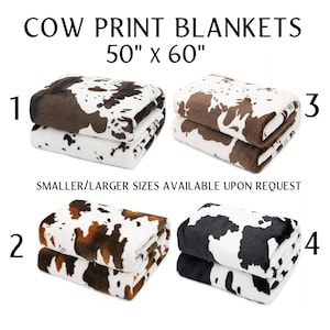 May include: Four folded cow print blankets, each with a different color pattern. The blankets are 50" x 60" and feature brown, black, and tan spots on a white background. The text "COW PRINT BLANKETS" is at the top.