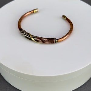Superb Handmade Healing medicine copper bracelet with spiral copper,white metal & Brass Centre piece ending joints are brass from Nepal.