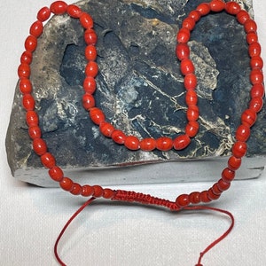 Beautiful Wearable & adjustable in length red glass beads necklace from Tibet and the Himalayas.