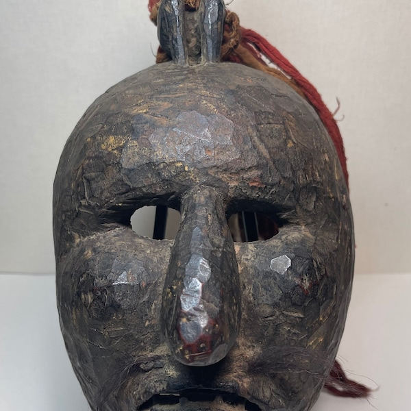 Rare master piece Antique Primitive Wooden Shaman Mask with a Figurine on its Head & beautiful beard /mustache from Western Nepal (Jumla).