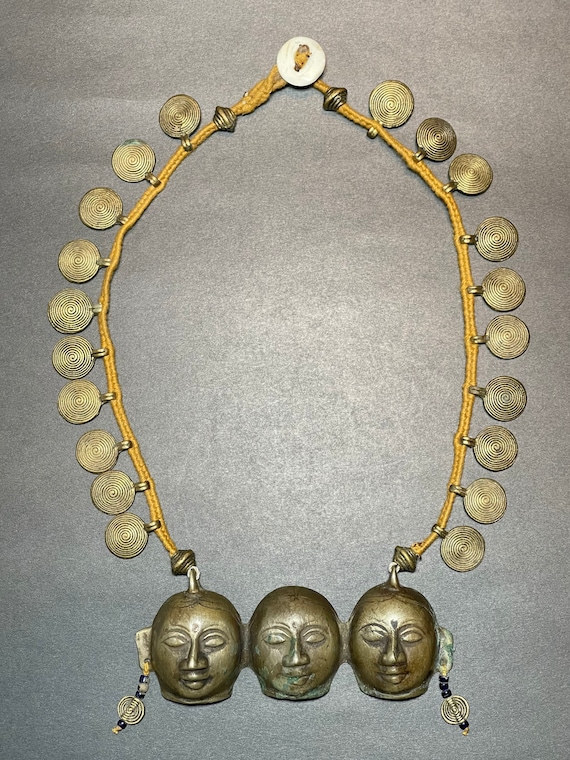 Stunning antique primitive tribal brass three face