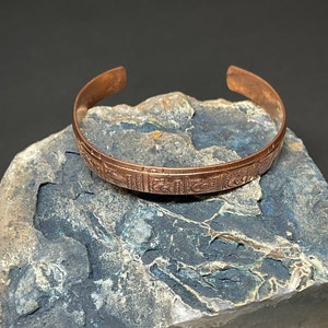 Fine Hand-hammered pure copper bracelet from Nepal with a Sanskrit mantra on the centerpiece.Wearable,adjustable & beautiful copper bracelet