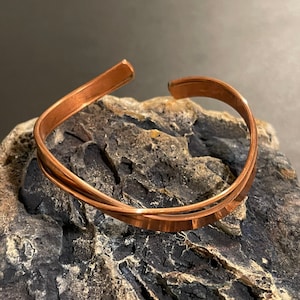 Beautiful and Unique handmade Copper Curved healing Bangle from Nepal.
