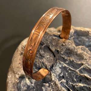Fine Handmade pure copper buddhist prayer healing bracelet from Nepal with the mantra’Om Mane Padme Hum’ (jewel in the lotus) written on it.
