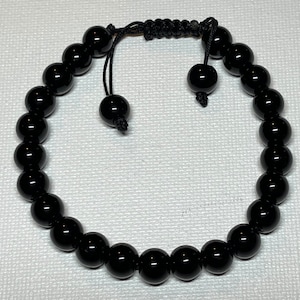 Striking Spiritual 8mm Smooth Rounded Black Onyx Beaded Protection Bracelet from the Himalayas
