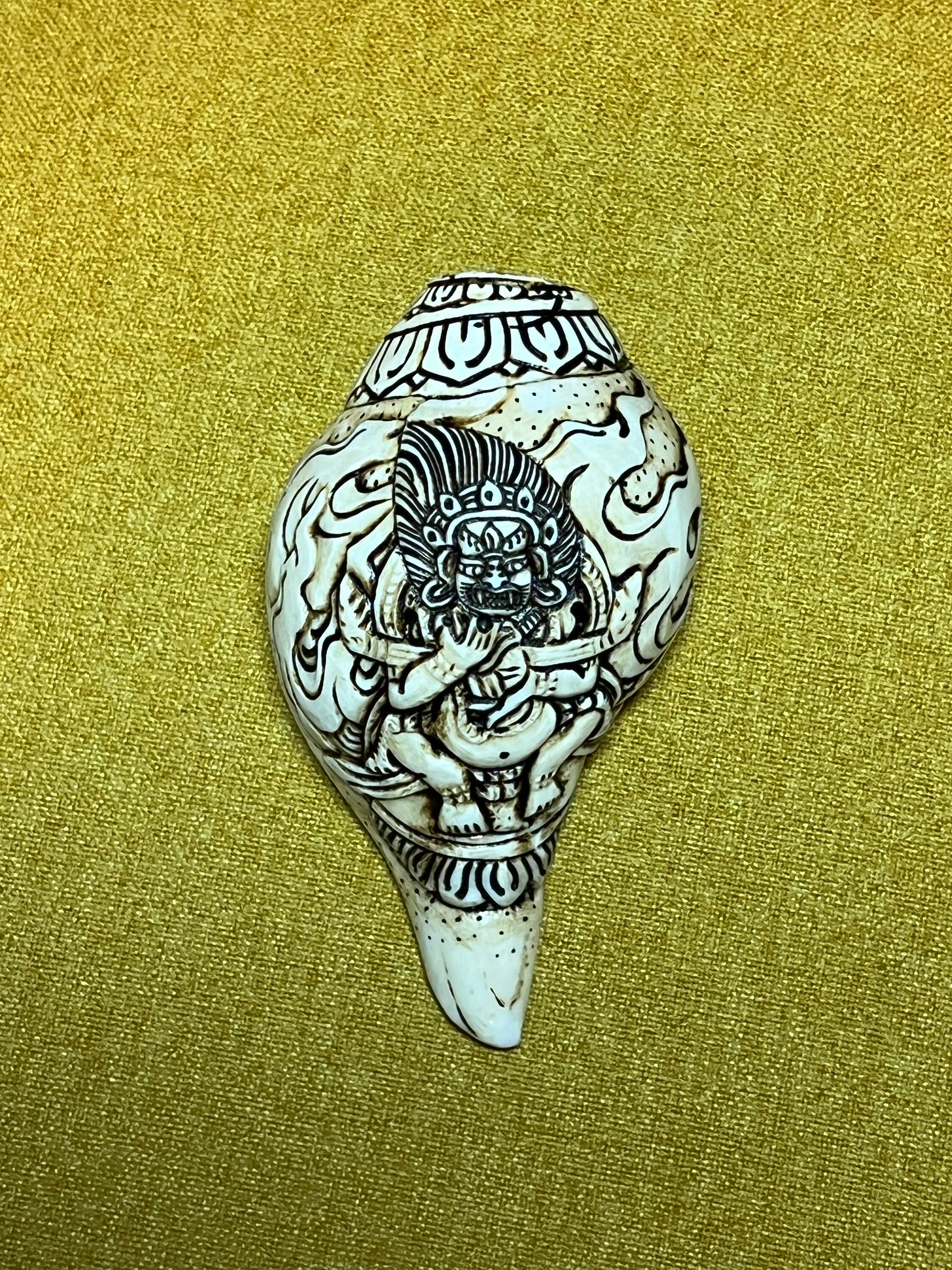 Stunning Old Hand-Carved mini / portable Conch Shell (sankha) from Nepal with a Carving of Mahakala (Hindu and Buddhist Deity)