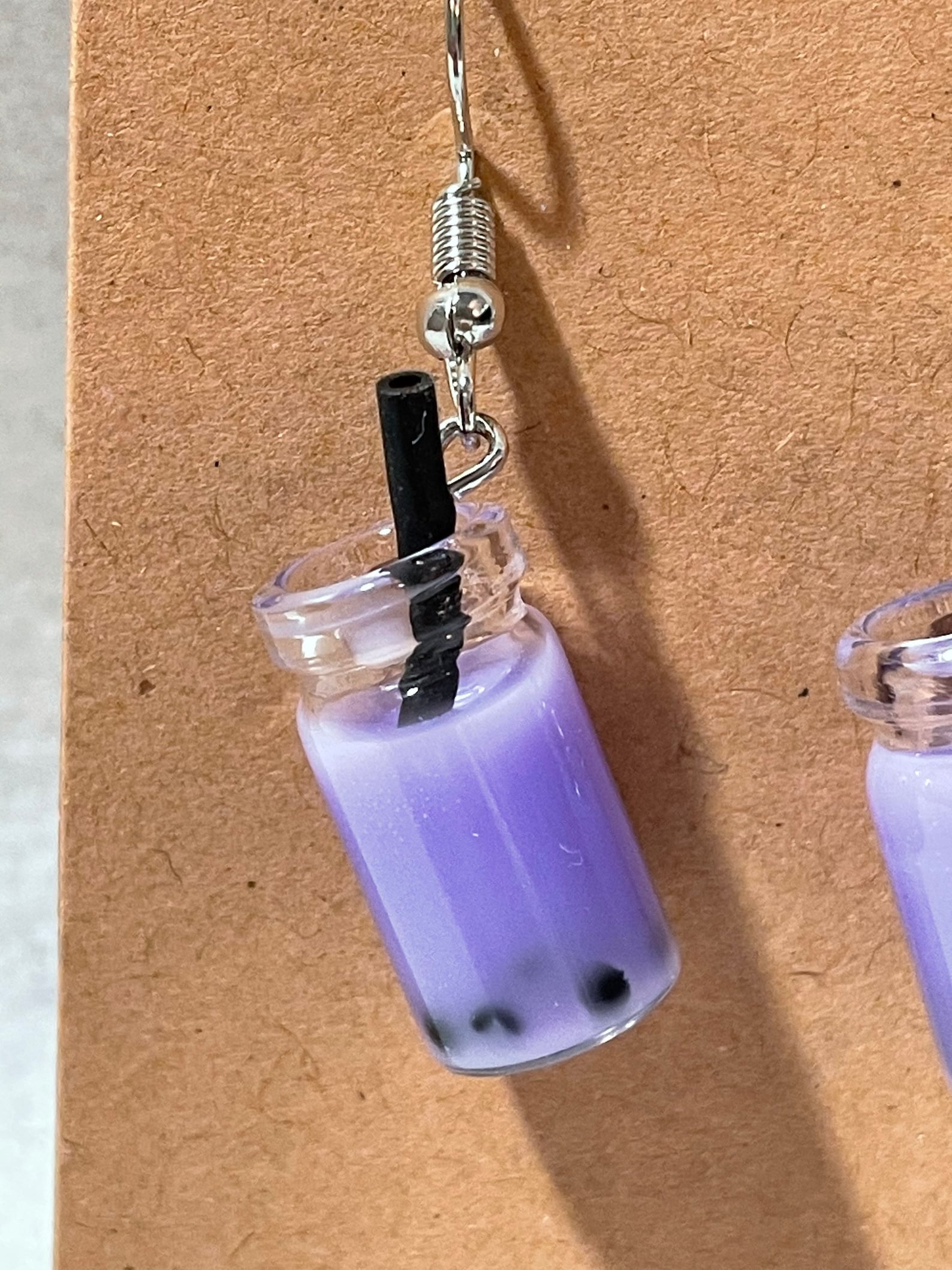Hypoallergenic purple boba earrings Etsy