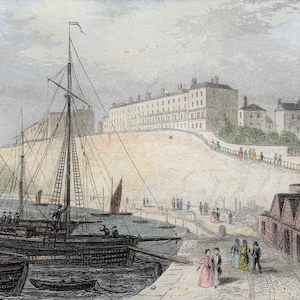 May include: A vintage illustration depicting a harbor scene with several ships docked at a pier. The ships have white sails and are anchored in front of a row of buildings on a cliff. People are walking along the pier and the cliff.