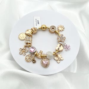 Linx Yellow Gold Snake Chain Bracelet with Mom and Themed Charms