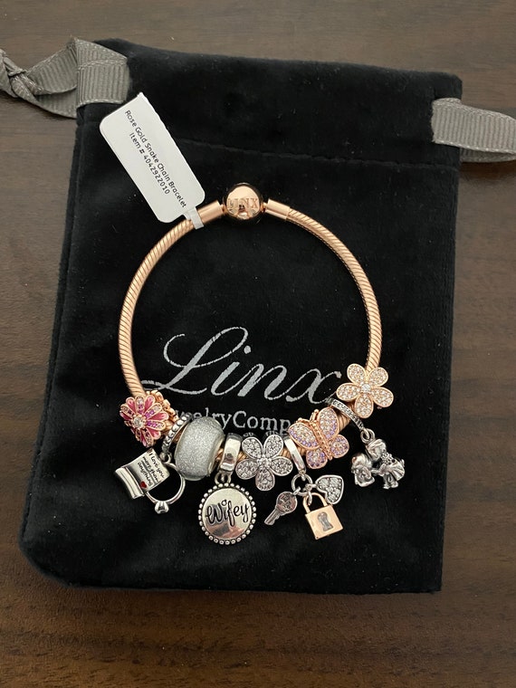 Snake Chain Bracelet With Rose Gold And Silver Charm Bracelet