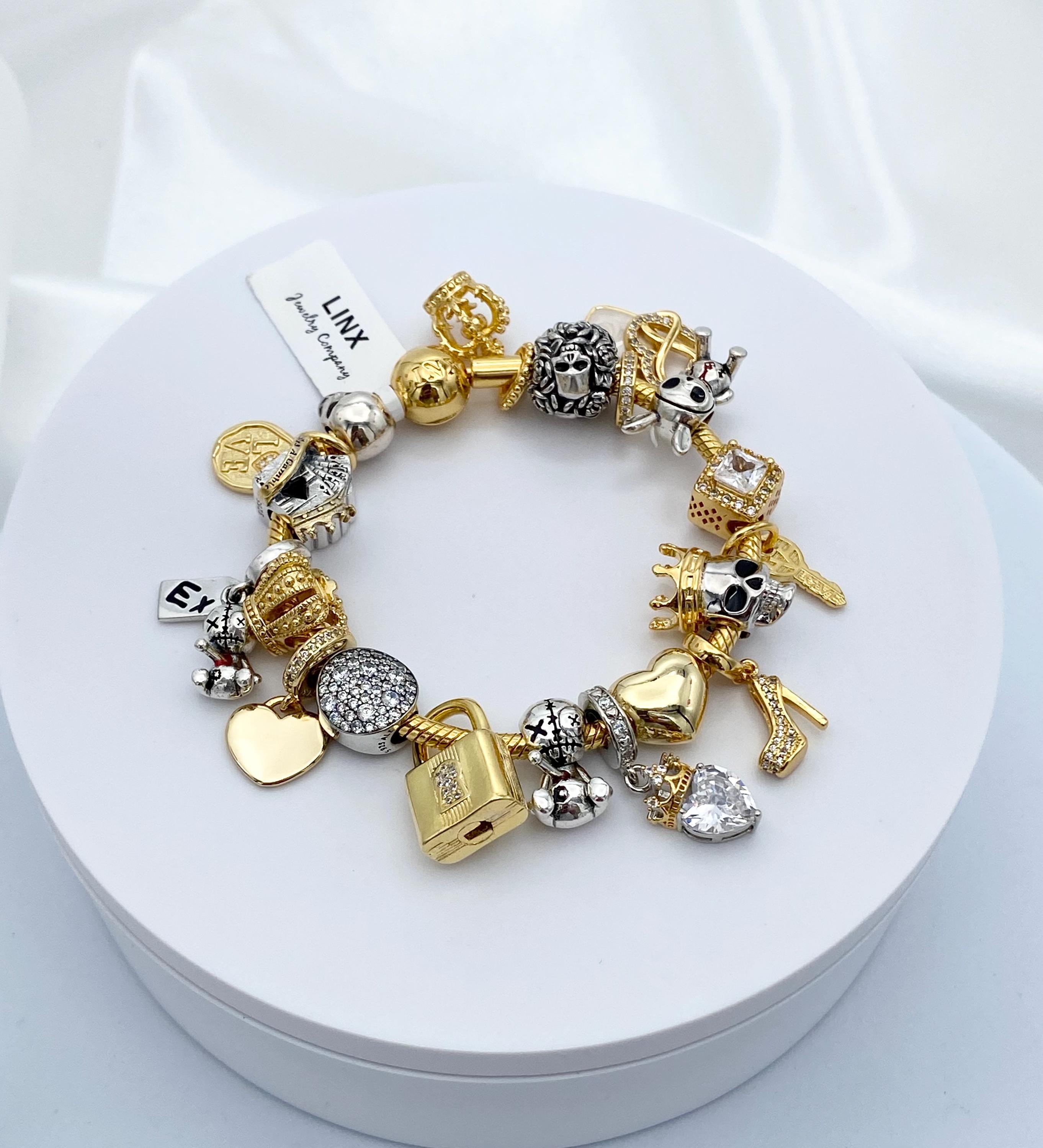 Linx イエローゴールド スネークチェーンブレスレット ロイヤルスカル