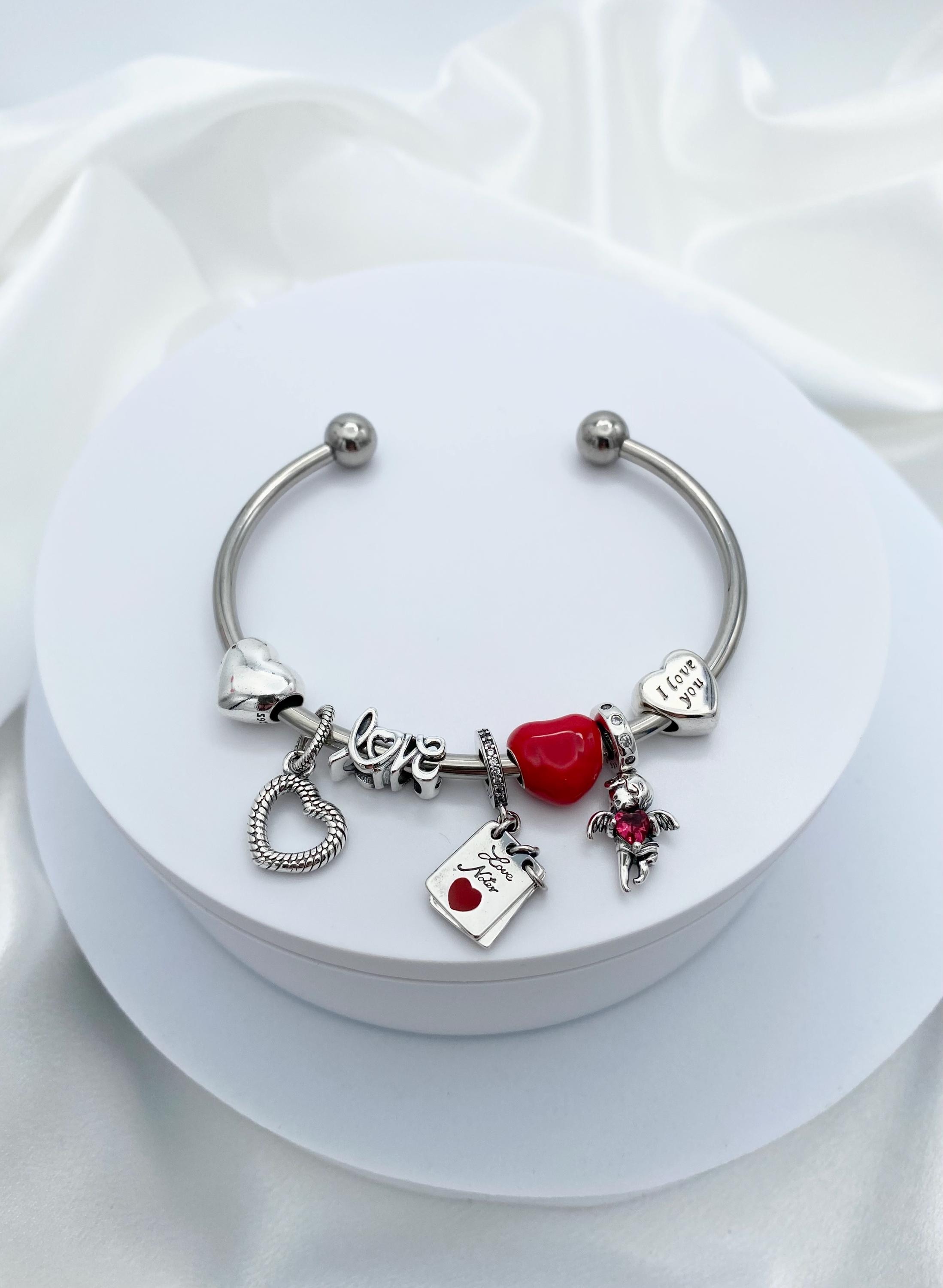 Linx Stainless Steel Open Bangle With Heart and Love Themed Charms