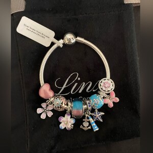 Linx Rose Gold Snake Chain Bracelet with Pale Pink Baby Blue Themed Charms