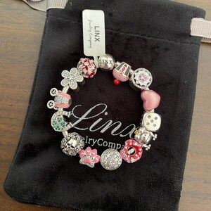 Linx Silver Snake Chain Bracelet with Silver and Pink Themed Charms 925 sterling silver
