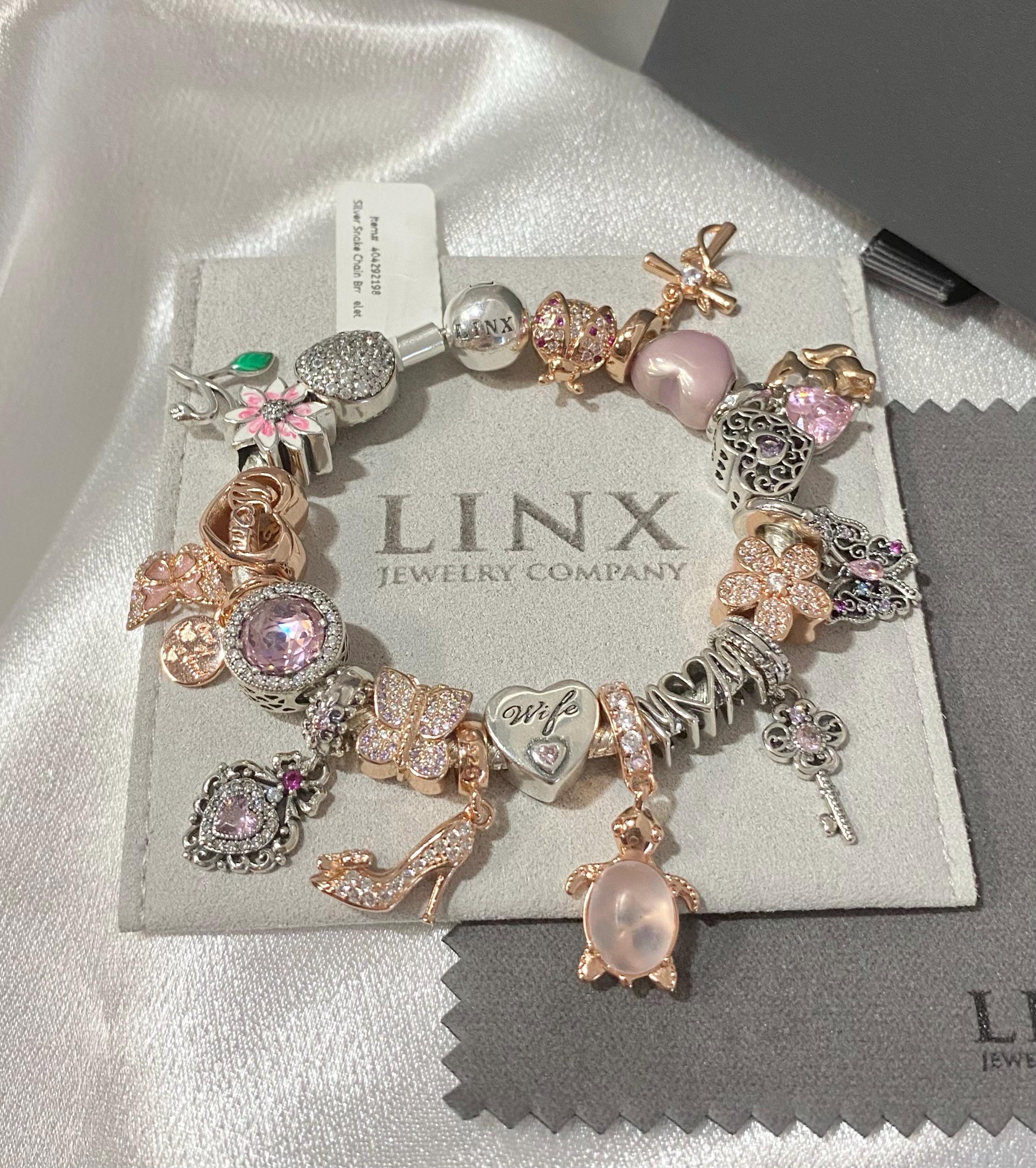 Linx Sterling Silver Snake Chain Charm Bracelet With Rose Gold and