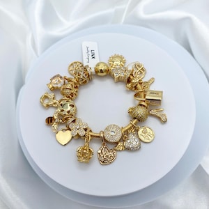 Linx Yellow Gold Snake Chain Bracelet with 22 Gold and Cubic Zirconia Themed Charms