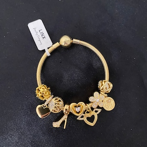 Linx Yellow Gold Snake Chain Bracelet with Gold Charms