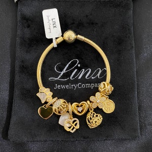 Linx Yellow Gold Snake Chain Bracelet with Gold and Cubic Zirconia Themed Charms