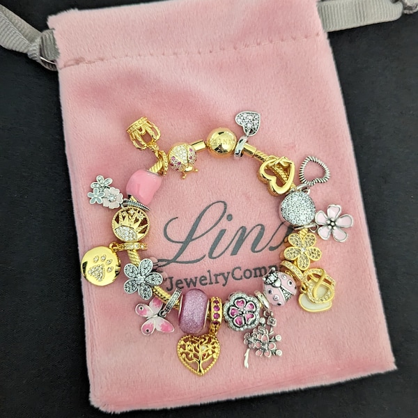 Linx Yellow Gold Snake Chain Bracelet with Pink Silver and Gold Themed Charms