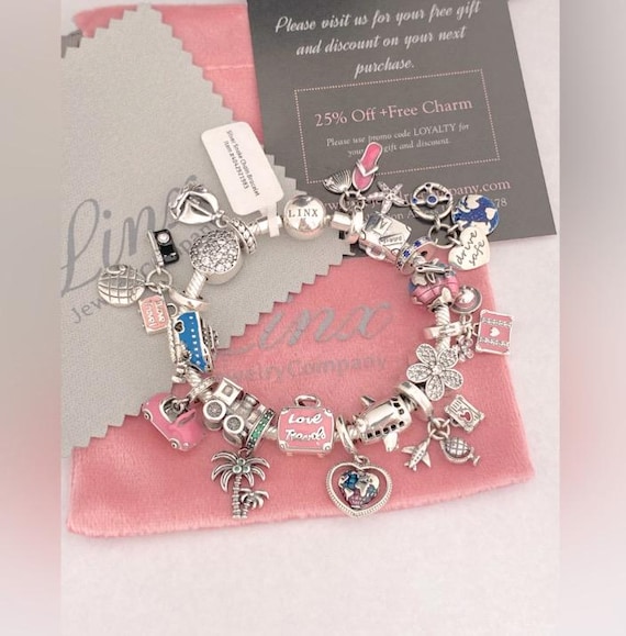 Linx Snake Chain Bracelet With Travel Themed Charms - Main Image