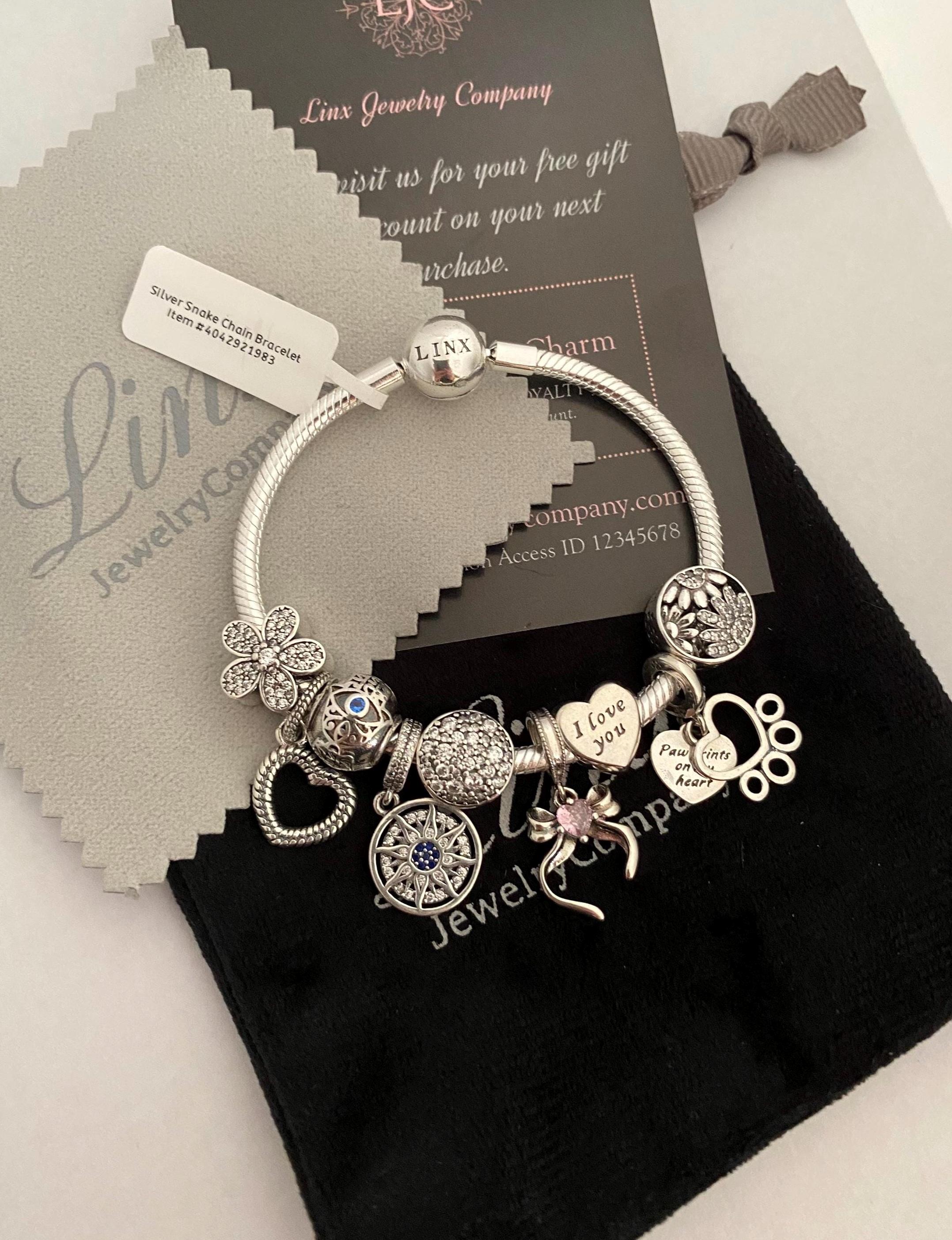 Linx Sterling Silver Charm Bracelet: Snake Chain With Flower
